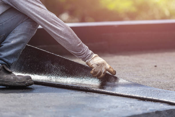 Professional Basement Waterproofing technician working in Shelby, MI